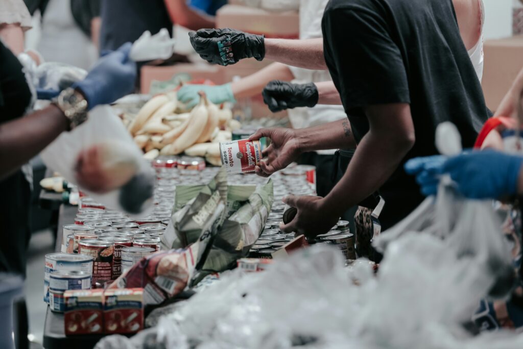 Volunteers distributing food at a community food bank.